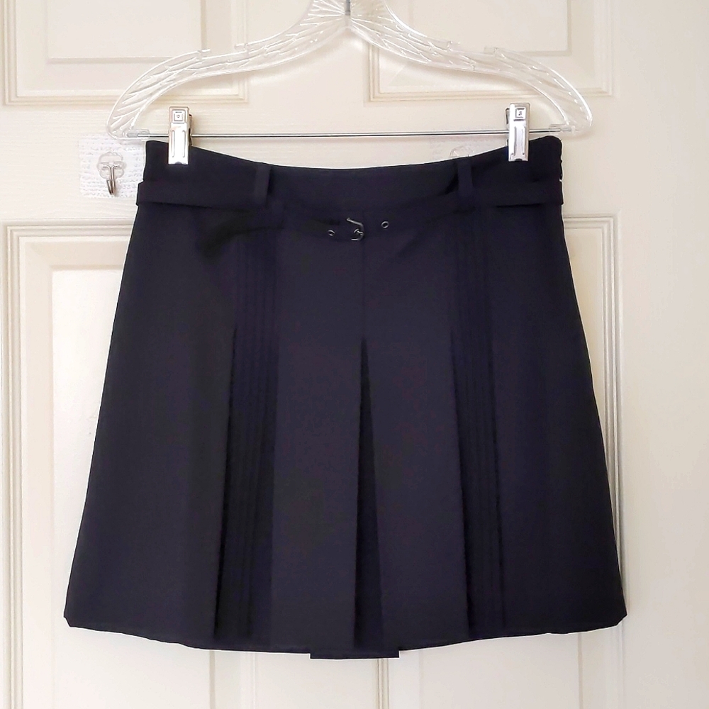 NWOT. The Limited Black Pleated Skirt with full lining and belt.